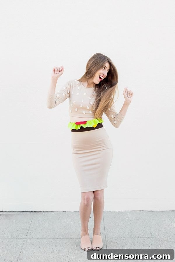 A woman posing for a picture, with Burger Costume