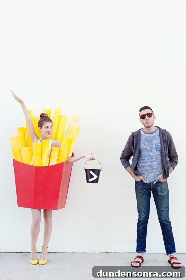 A woman dressed in a french fry costume