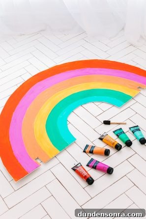 Creative DIY Weather-Themed Family Costume Ideas 14 Rainbow with paints