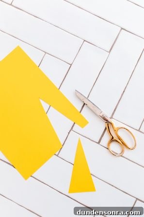 Creative DIY Weather-Themed Family Costume Ideas 6 Someone cutting yellow paper