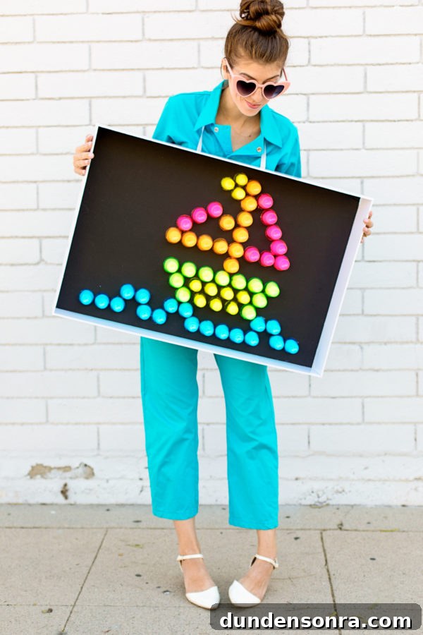 DIY Lite-Brite Halloween Costume Ideas and How to Make One 2 A person holding a lite brite