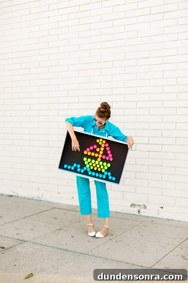 DIY Lite-Brite Halloween Costume Ideas and How to Make One 11 A person holding a sign