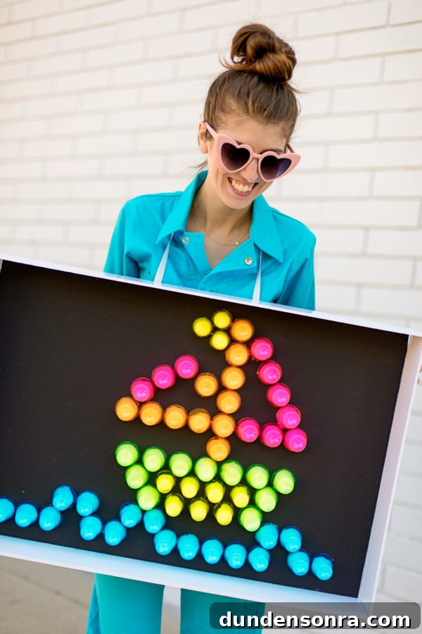 DIY Lite-Brite Halloween Costume Ideas and How to Make One 4 A woman holding a light brite