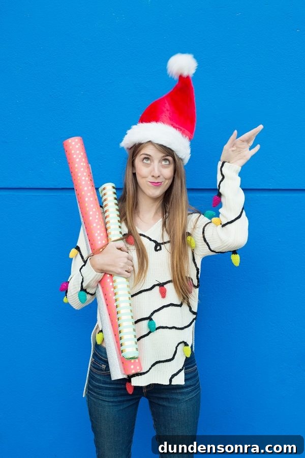 22 Festive Colorful Holiday DIYs for Bright Seasonal Decor 11 A woman wearing a christmas light sweater