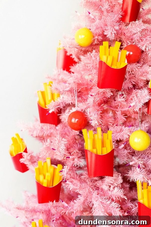 22 Festive Colorful Holiday DIYs for Bright Seasonal Decor 10 Fries ornaments on a pink Christmas tree