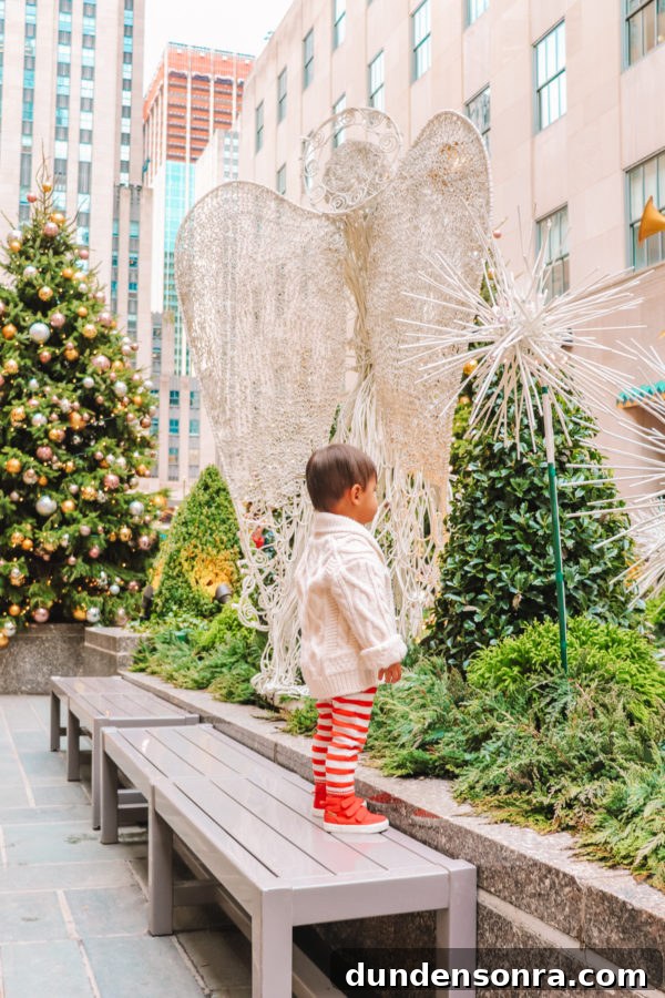 Arlo’s First Christmas in New York City: A Festive NYC Holiday Adventure 2 A person standing on a bench