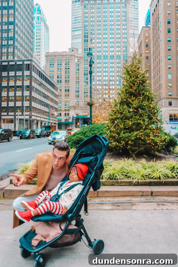 Arlo’s First Christmas in New York City: A Festive NYC Holiday Adventure 16 A boy sitting in a stroller