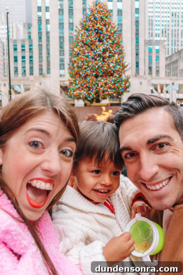 Arlo’s First Christmas in New York City: A Festive NYC Holiday Adventure 4 A group of people posing for the camera