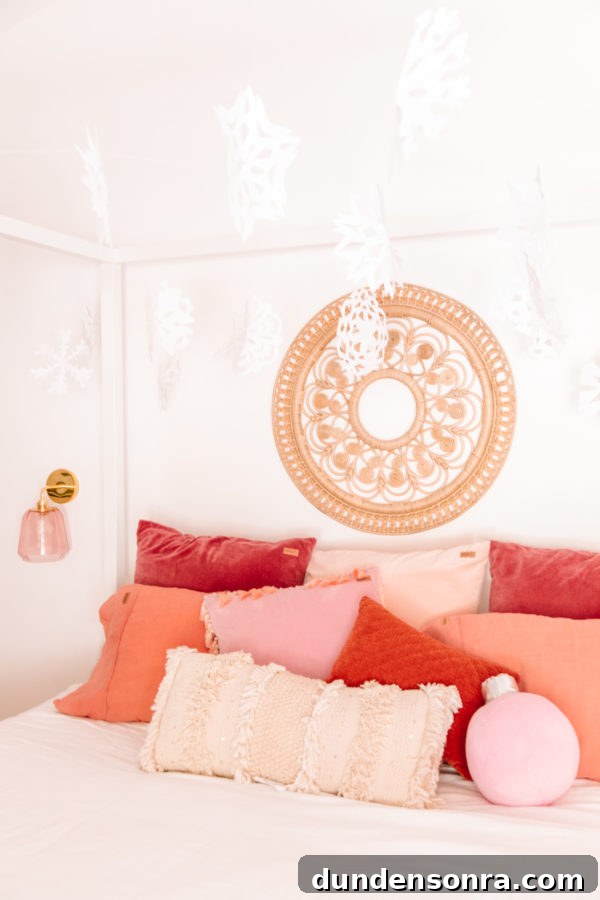 Holiday Home Tour: Inside The Mindwelling’s Festive Decor 6 Colorful pillows on a bed