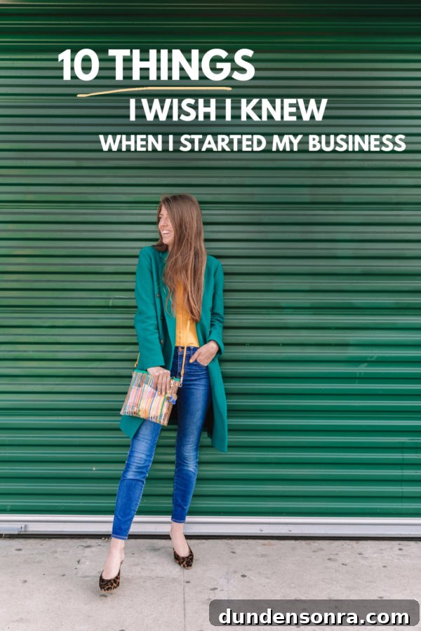 10 Lessons I Wish I Knew Before Starting My Business 2 A woman standing in front of a green wall