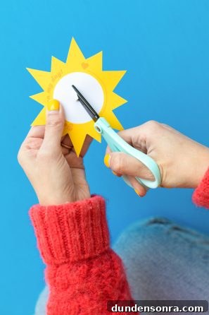 Printable Outer Space Valentines for Toddlers — DIY Cards to Make and Share 7 Someone cutting a sun