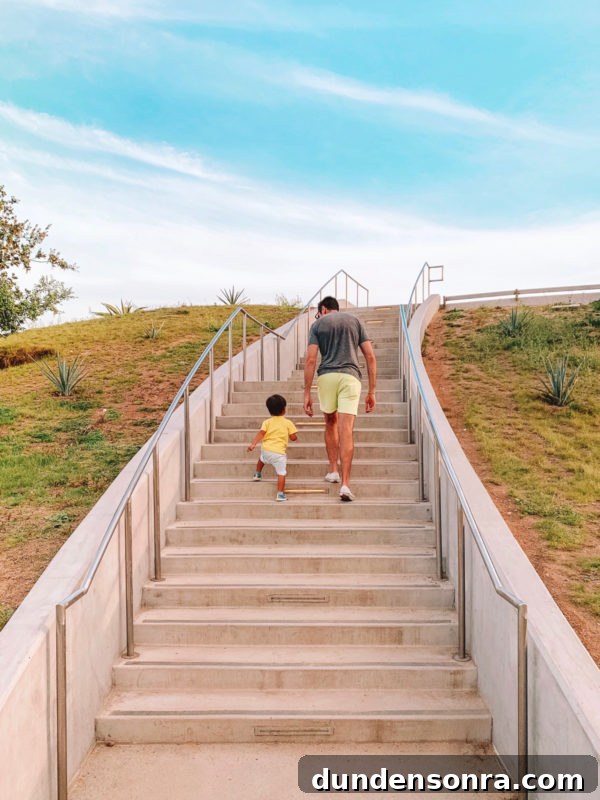 A man walking up the stairs