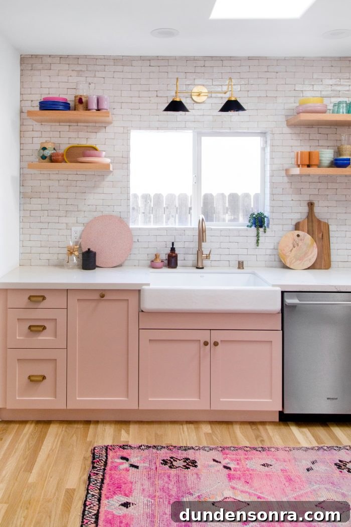 Kitchen Reveal: Before & After Remodel Tour of Our Home 17 A kitchen with a sink and a window