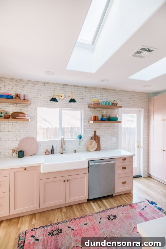 Kitchen Reveal: Before & After Remodel Tour of Our Home 22 A kitchen with a sink and a window