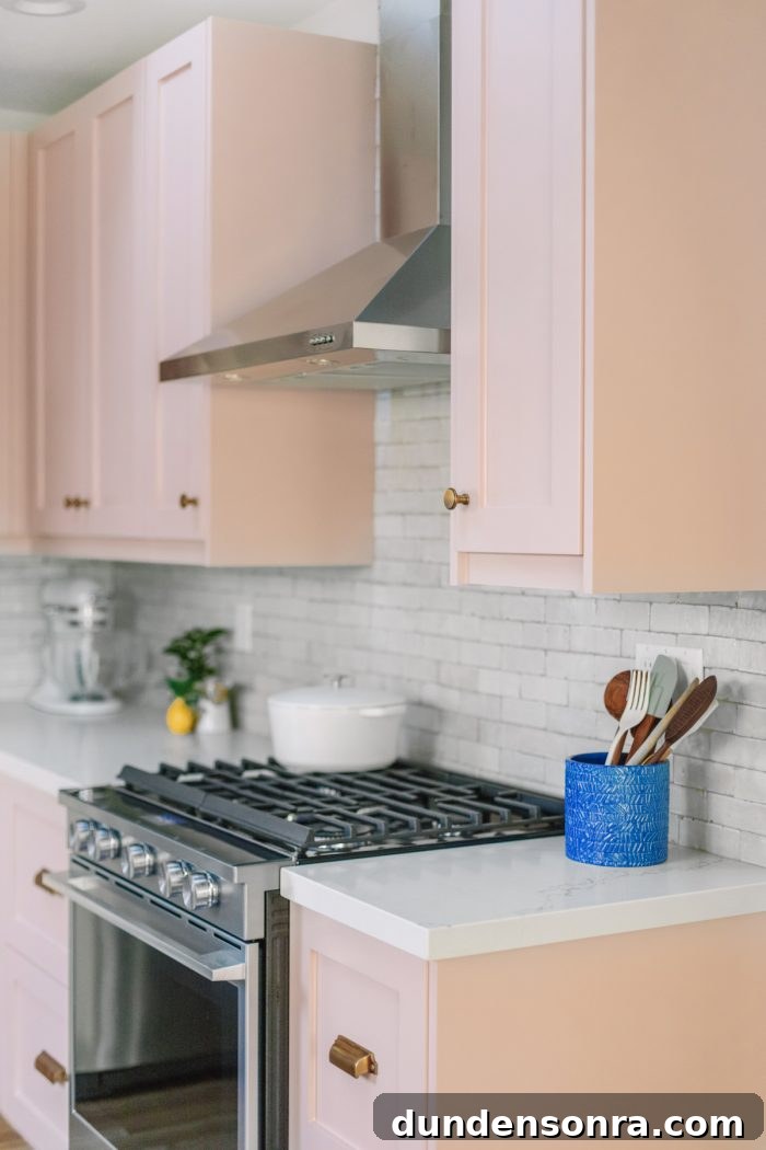 Kitchen Reveal: Before & After Remodel Tour of Our Home 10 A stove top oven sitting inside of a kitchen