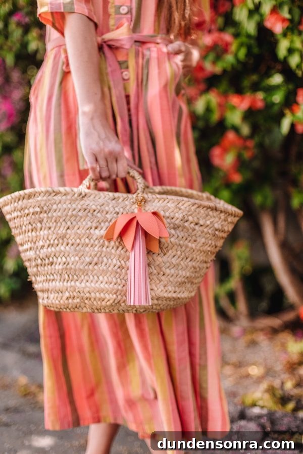 A woman wearing a pink dress holding a basket