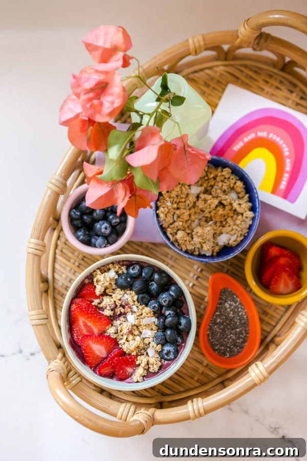 A bowl filled with different types of food on a table