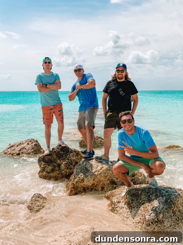 Beaches Turks and Caicos Review: Tips for Traveling with Toddlers 23 A group of people standing next to a body of water