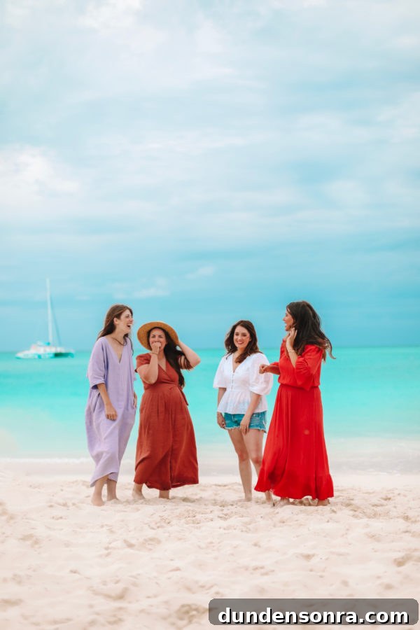 Beaches Turks and Caicos Review: Tips for Traveling with Toddlers 27 A group of people standing on a sandy beach