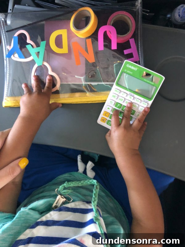 Flying With a Baby or Toddler: Tips, Gear & Plane Activities 9 Calculator and clutch