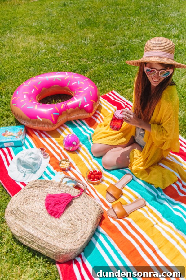 Family Pool Day Packing List: Essentials for Parents and Kids 3 A person wearing a colorful blanket