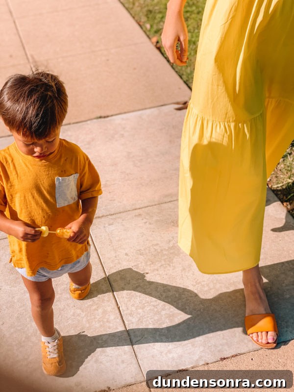 Real Moms Speak: Religion, Spirituality, and Family Life 4 A little boy wearing orange