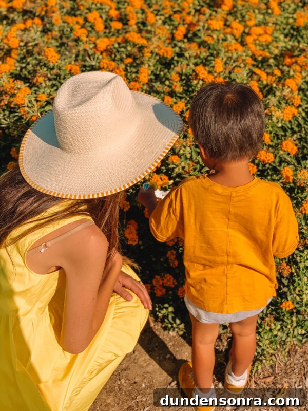 Real Moms Speak: Religion, Spirituality, and Family Life 5 A woman wearing a hat and a little boy wearing orange