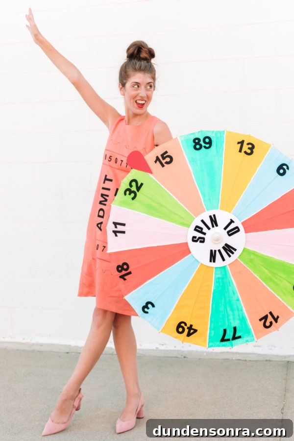 Someone holding a colorful wheel