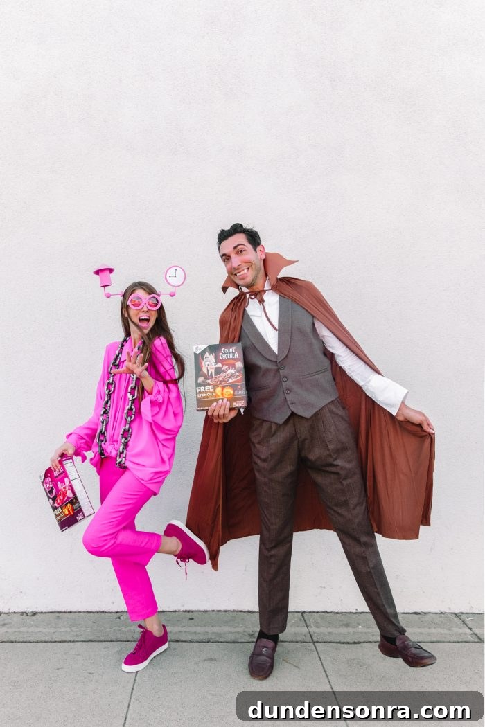 A man and a woman posing and wearing a costume