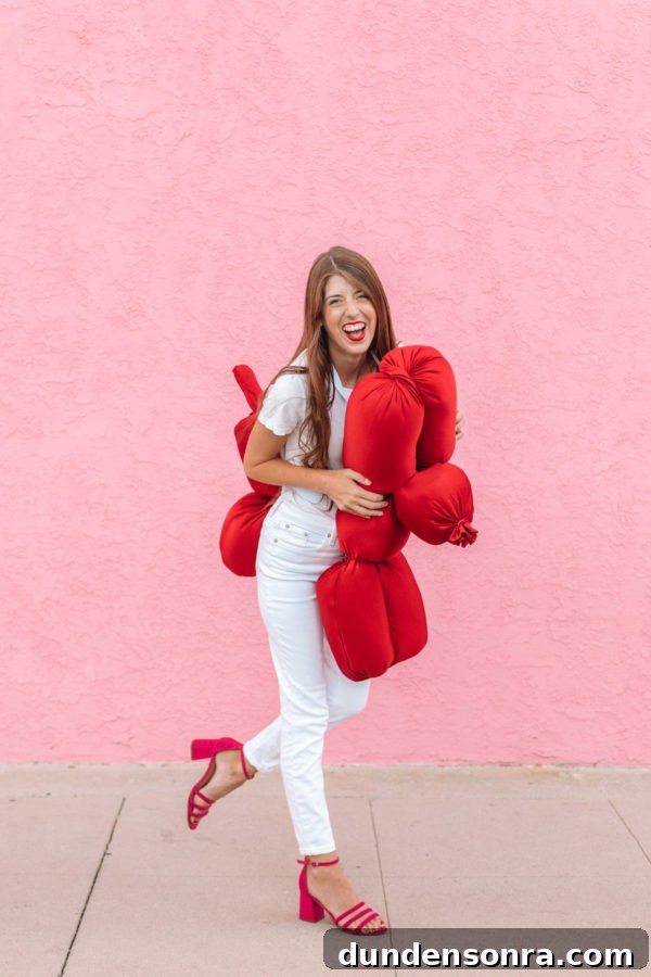A woman in a balloon dog costume