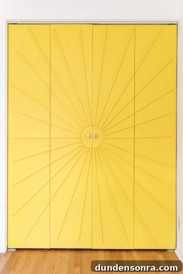 A close up of a yellow door