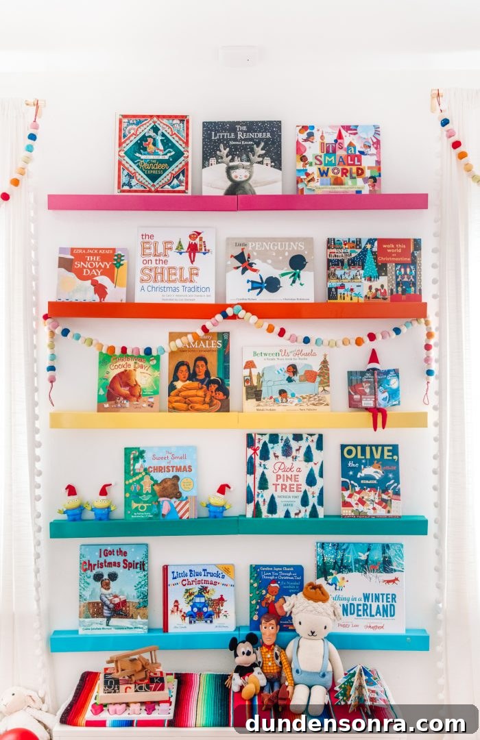 Step Inside Our Festive Holiday Home Tour 22 A close up of rainbow bookshelves
