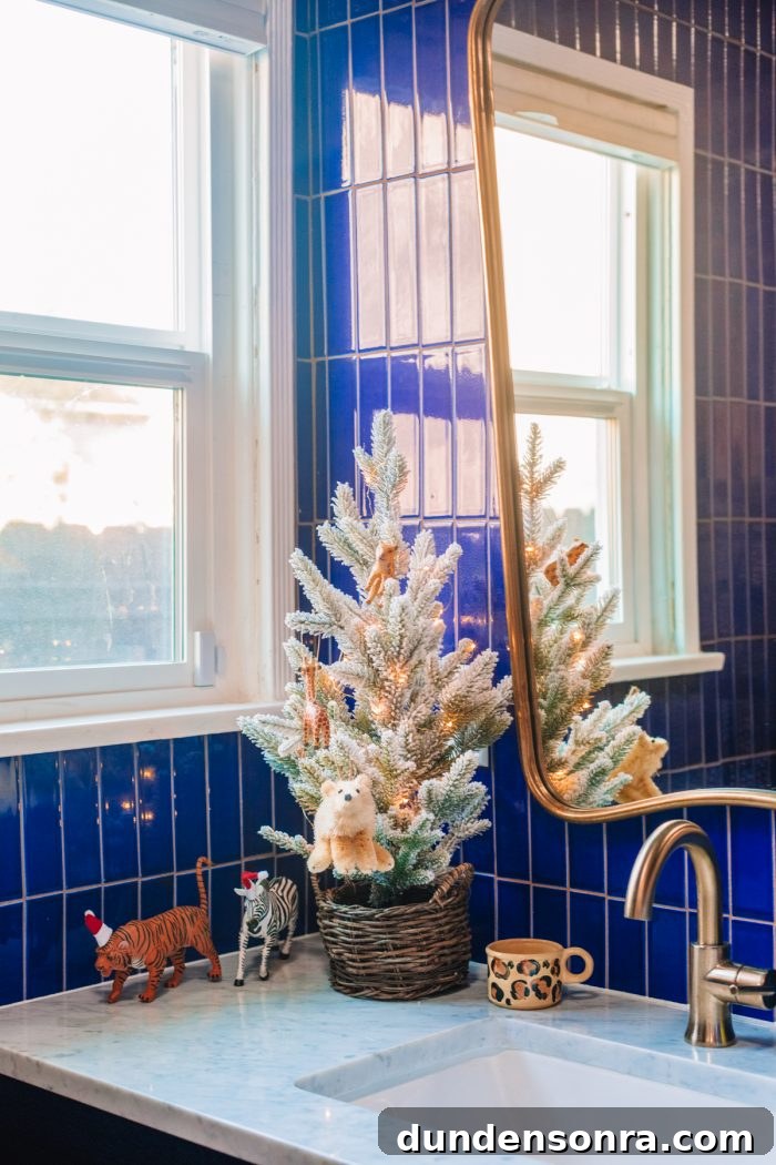 Step Inside Our Festive Holiday Home Tour 27 Animal Themed Christmas Tree in a Kids Bathroom