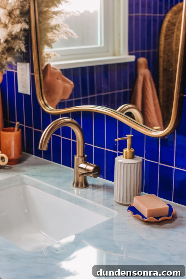 A close up of a sink and a mirror