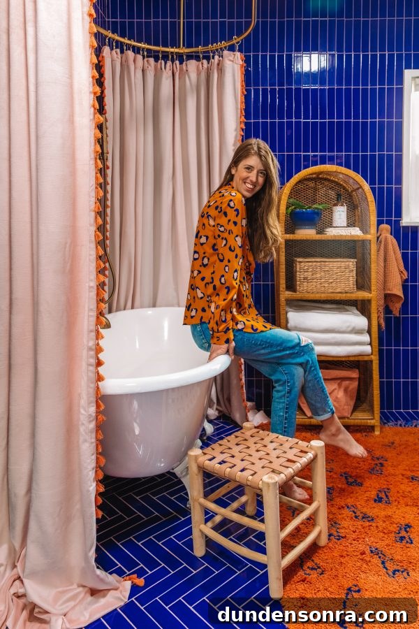 A person sitting on a bathtub 