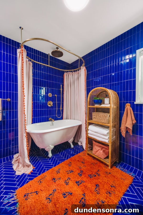 A room with a blue tiled wall