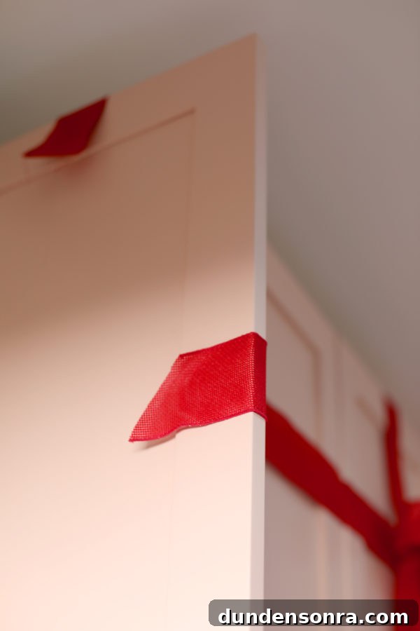 Turn Kitchen Cabinets into Charming Christmas Gift Boxes 5 A close up of a a cabinet