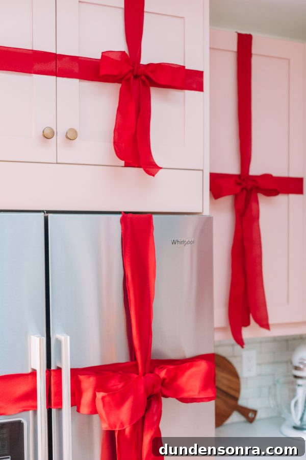 Turn Kitchen Cabinets into Charming Christmas Gift Boxes 6 Ribbon and Red