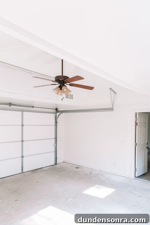 An empty room with a fan