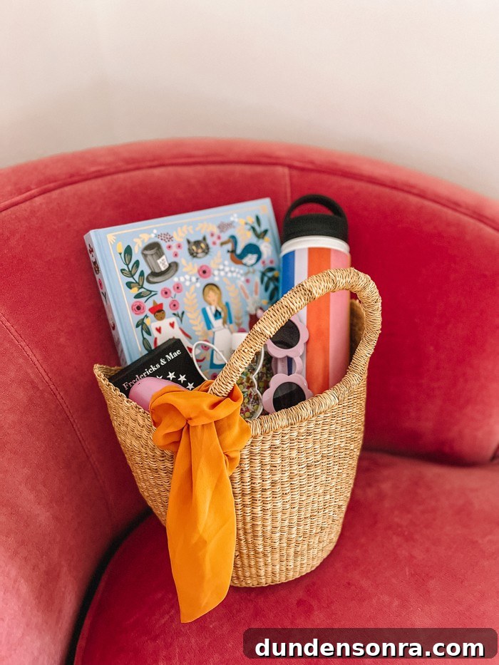 easter basket with book, water bottle and sunglasses