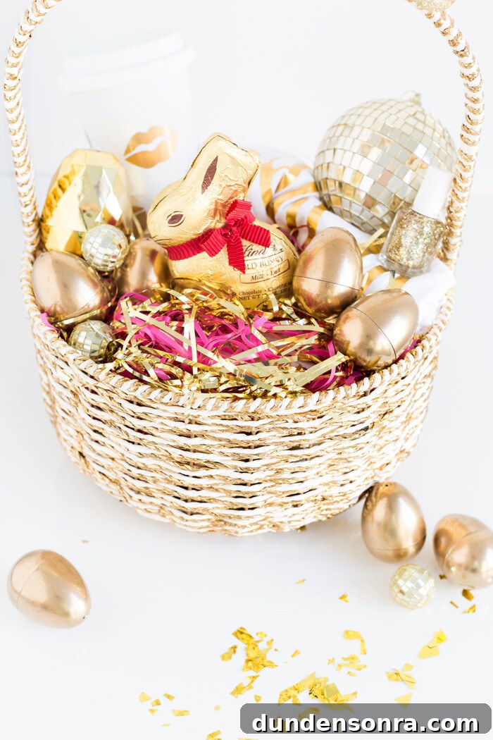Gold Easter basked with gold-themed goodies inside. 