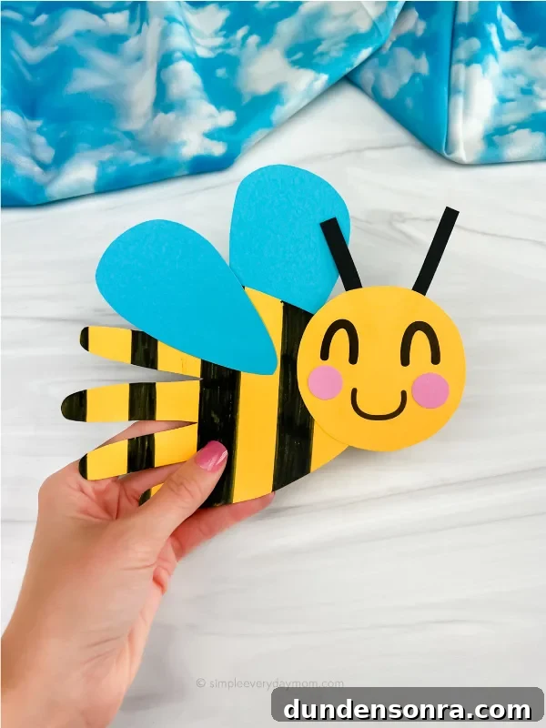 24 Fun Bug Crafts and Activities for Kids to Try Today 9 hand print bee craft