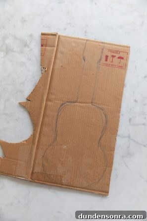 Sound of Music Crafts for Kids: Fun DIY Projects Inspired by the Film 4 Cardboard with guitar drawing