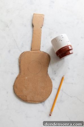 Sound of Music Crafts for Kids: Fun DIY Projects Inspired by the Film 5 A cardboard guitar