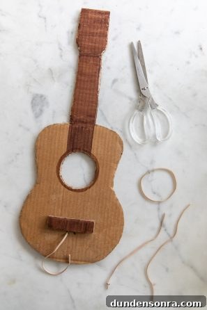 Sound of Music Crafts for Kids: Fun DIY Projects Inspired by the Film 6 A cardboard guitar