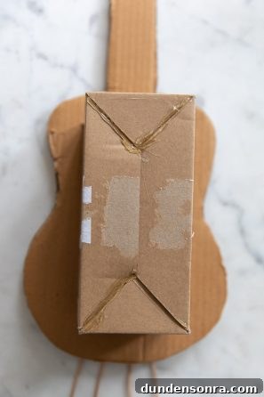 Sound of Music Crafts for Kids: Fun DIY Projects Inspired by the Film 7 A cardboard box