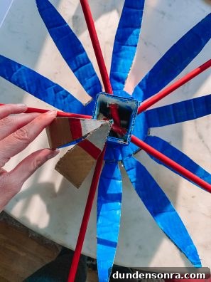 Build a Cardboard Dumbo Ride: Step-by-Step DIY Guide 13 A close up blue cardboard
