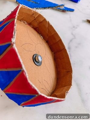 Build a Cardboard Dumbo Ride: Step-by-Step DIY Guide 8 A close up of a cardboard toy
