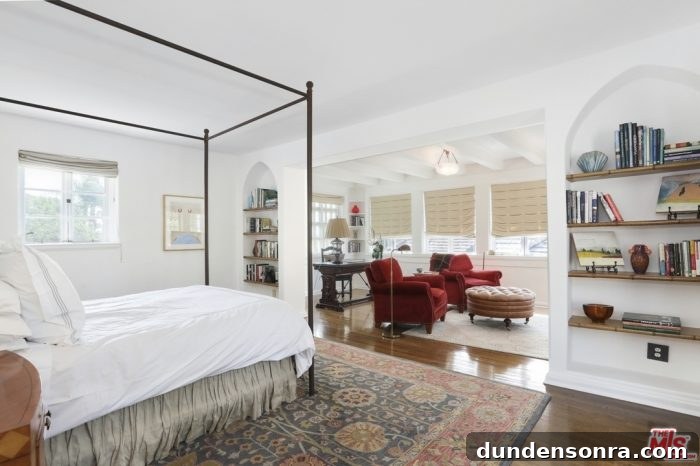 A bedroom with a large bed in a room