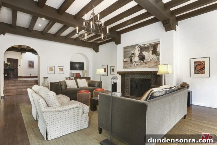 A living room filled with furniture and a fireplace